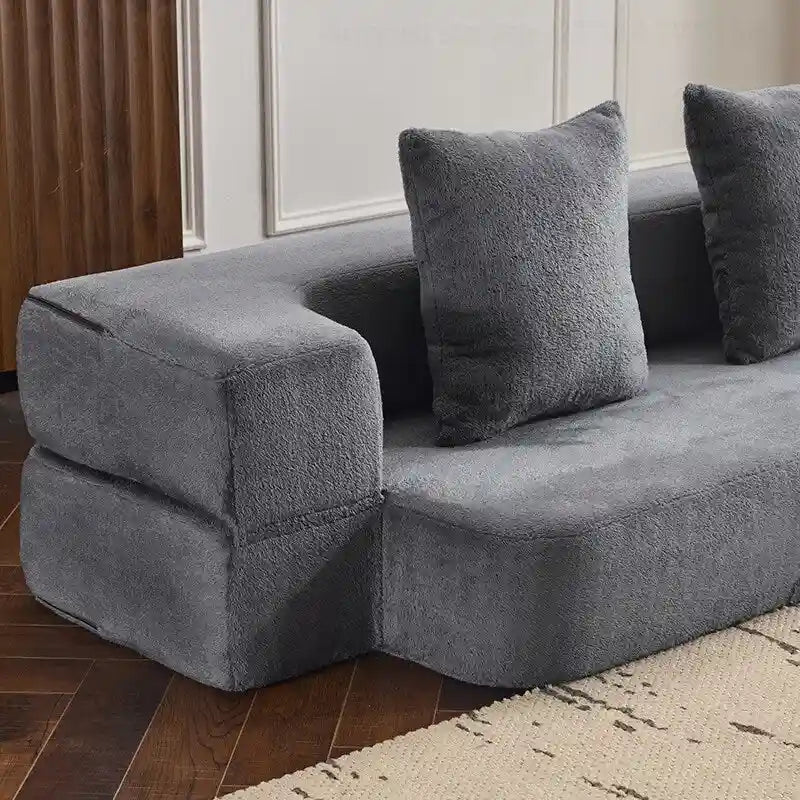 Canapé transformable polyvalent avec poufs-ottomans pour petits espaces