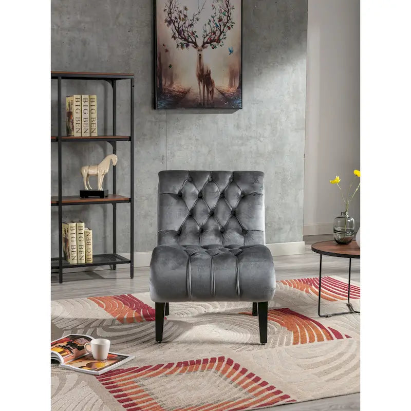 Fauteuil de salon capitonné en velours avec pieds en bois