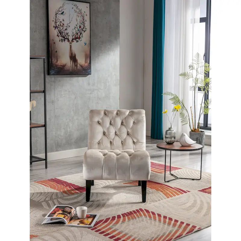 Fauteuil de salon capitonné en velours avec pieds en bois