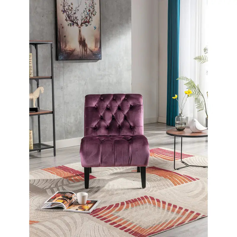 Fauteuil de salon capitonné en velours avec pieds en bois