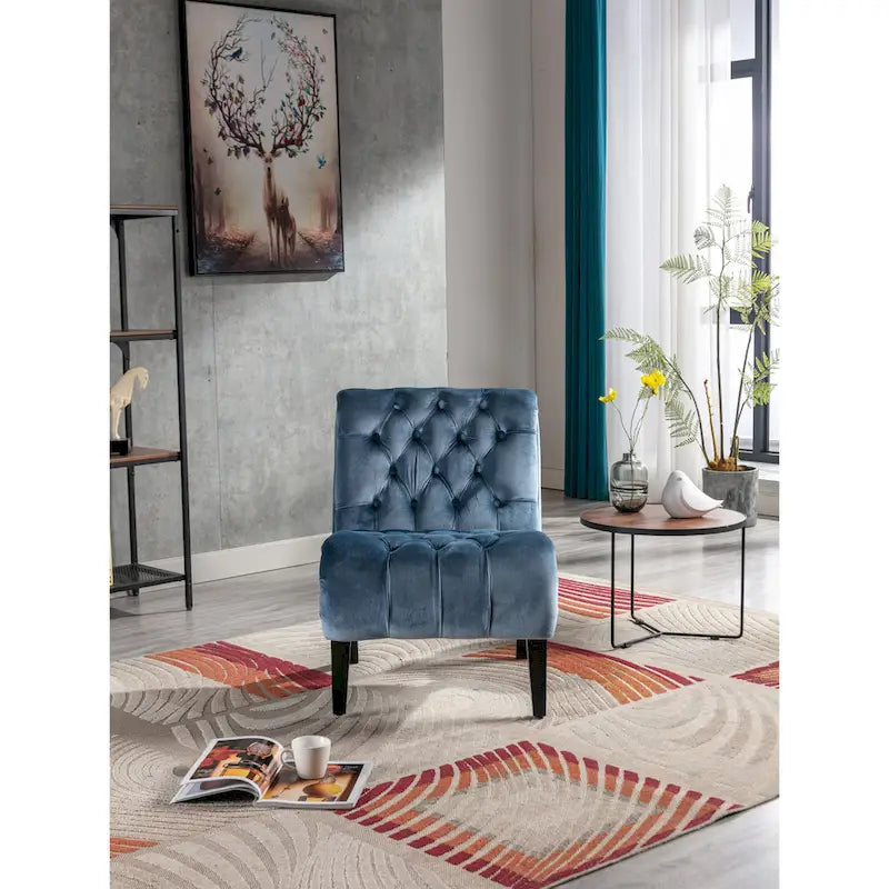 Fauteuil de salon capitonné en velours avec pieds en bois