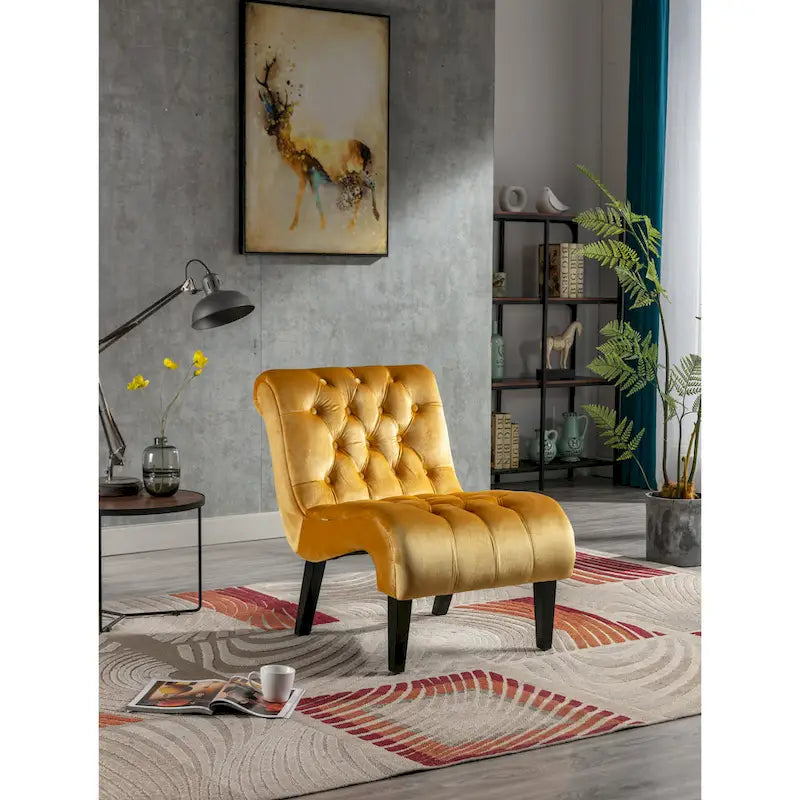 Fauteuil de salon capitonné en velours avec pieds en bois