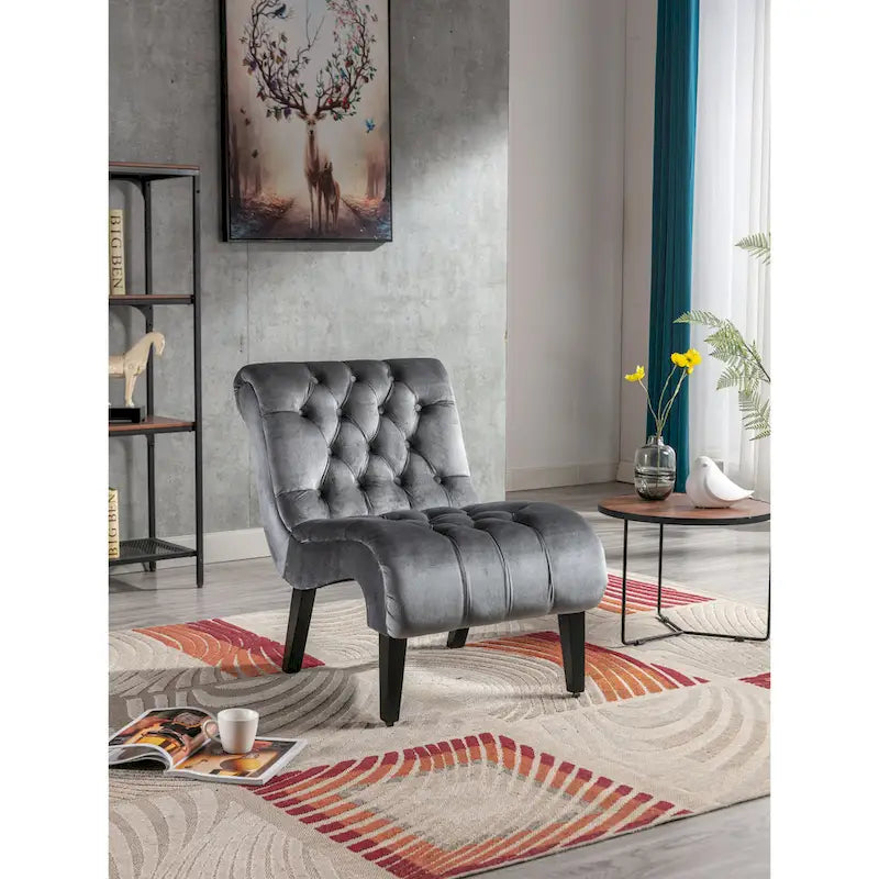 Fauteuil de salon capitonné en velours avec pieds en bois